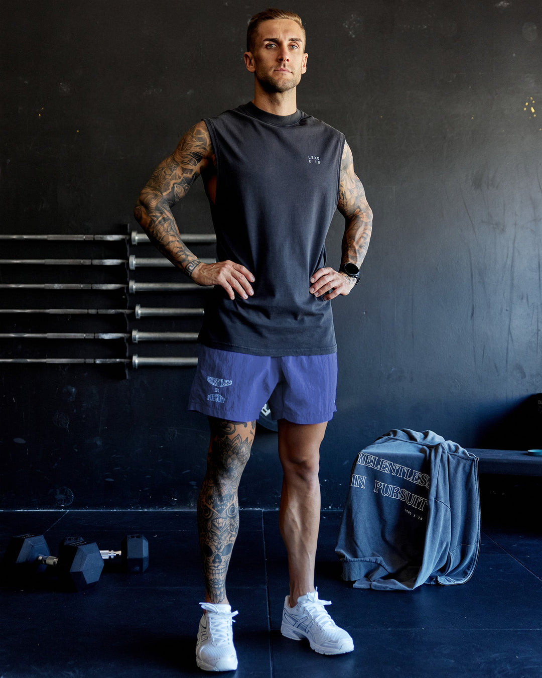 Man wearing Washed Relentless Heavyweight Oversized Tank - Black-Grey | Model:Tommy | Size:S