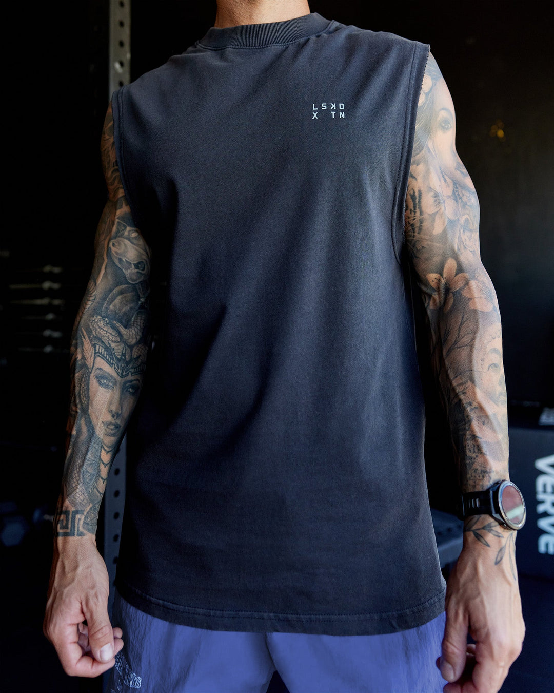 Man wearing Washed Relentless Heavyweight Oversized Tank - Black-Grey | Model:Tommy | Size:S