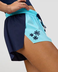 Woman wearing GG Accelerate 3" Mid-Rise Running Short - Future Navy-Baltic Sea | Model:Grace | Size:S