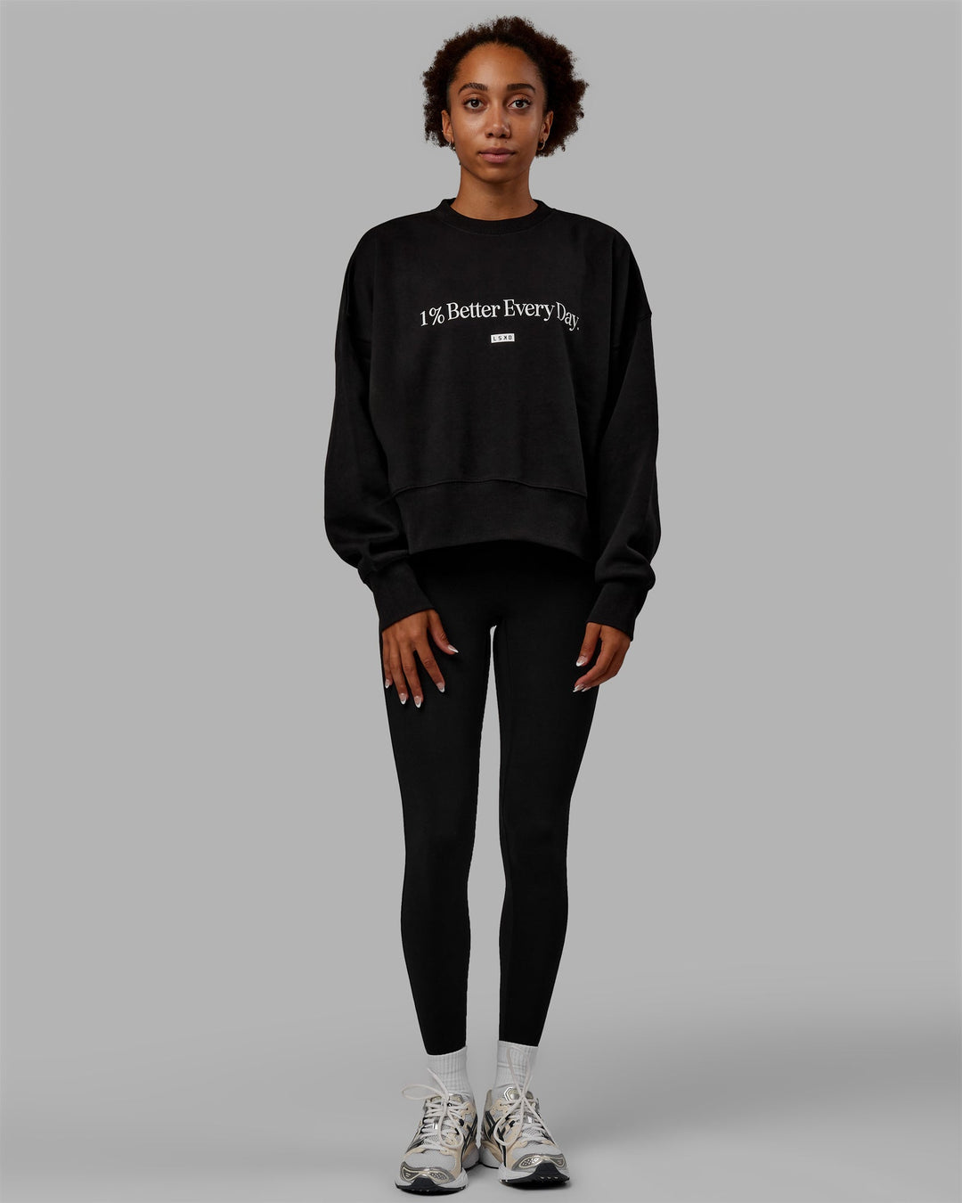 Woman wearing 1% Better Heavyweight Sweater - Black-White