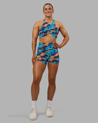 Woman wearing AMRAP High Neck Sports Bra - React Print | Model:Georgia | Size:S | Thumbnail Index: 7