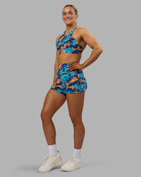 Woman wearing AMRAP High Neck Sports Bra - React Print | Model:Georgia | Size:S | Thumbnail Index: 4