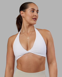Woman wearing Abs Agile Halter Sports Bra - White | Model:Abbey | Size:S | Thumbnail Index: 1
