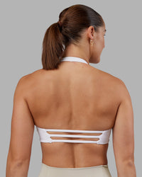 Woman wearing Abs Agile Halter Sports Bra - White | Model:Abbey | Size:S | Thumbnail Index: 3