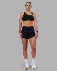 Woman wearing Accelerate 3" High-Rise Running Short - Black | Model:Keisha | Size:S