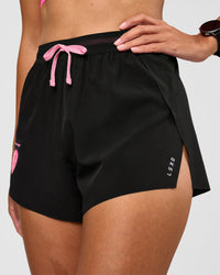 Woman wearing Accelerate 3" High-Rise Running Short - Black-Enjoy The Journey | Set:true | Angle:closeup | Model:Rhiley | Size:S