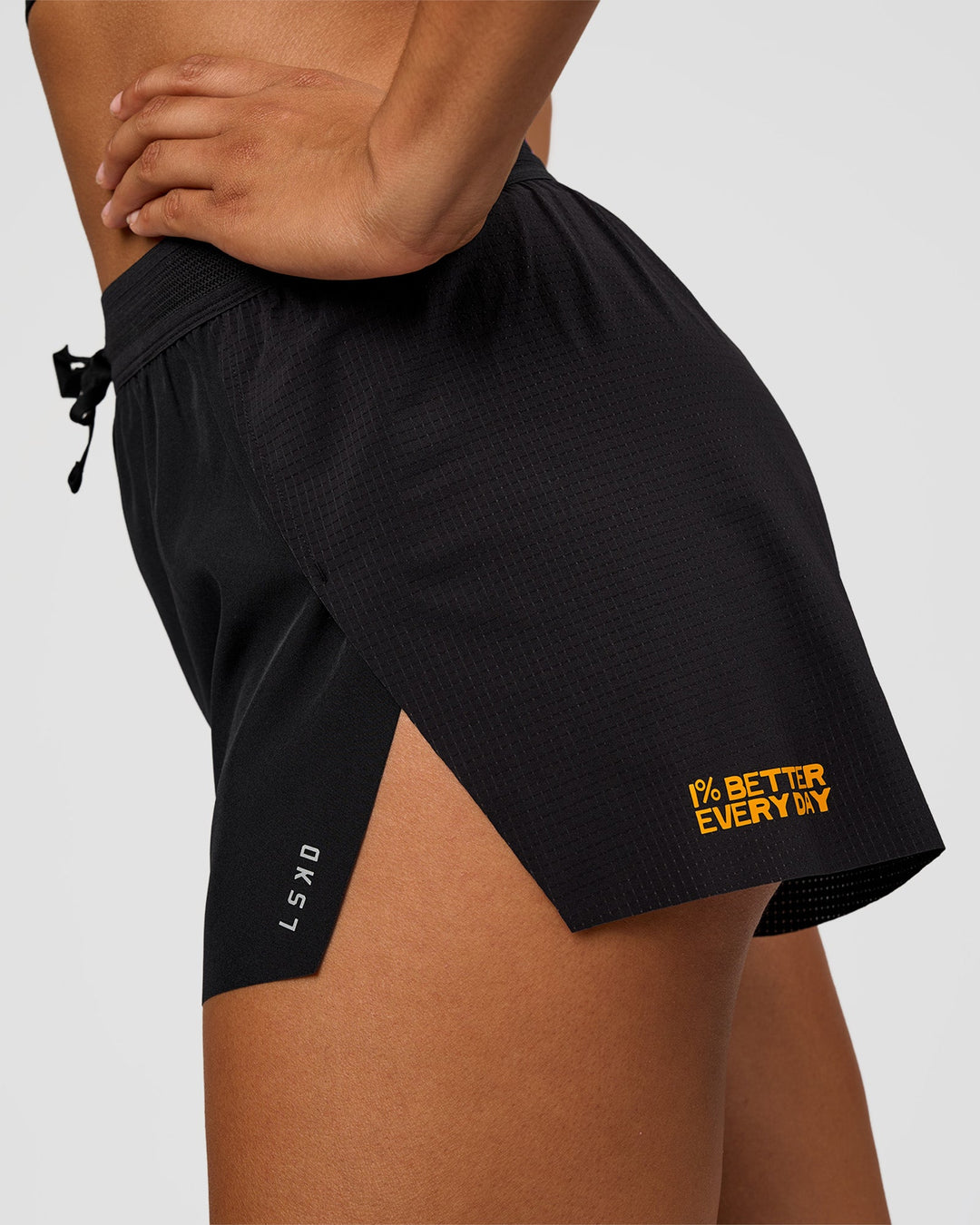 Woman wearing Accelerate 3" High-Rise Running Short - Black-Radiate | Model:Rosie | Size:S