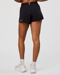 Woman wearing Accelerate 3" High-Rise Running Short - Black-Radiate | Model:Rosie | Size:S