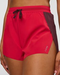 Woman wearing Accelerate 3" High-Rise Running Short - Cherry Lacquer-Scarlet | Model:Rosie | Size:S | | Thumbnail Index: 0