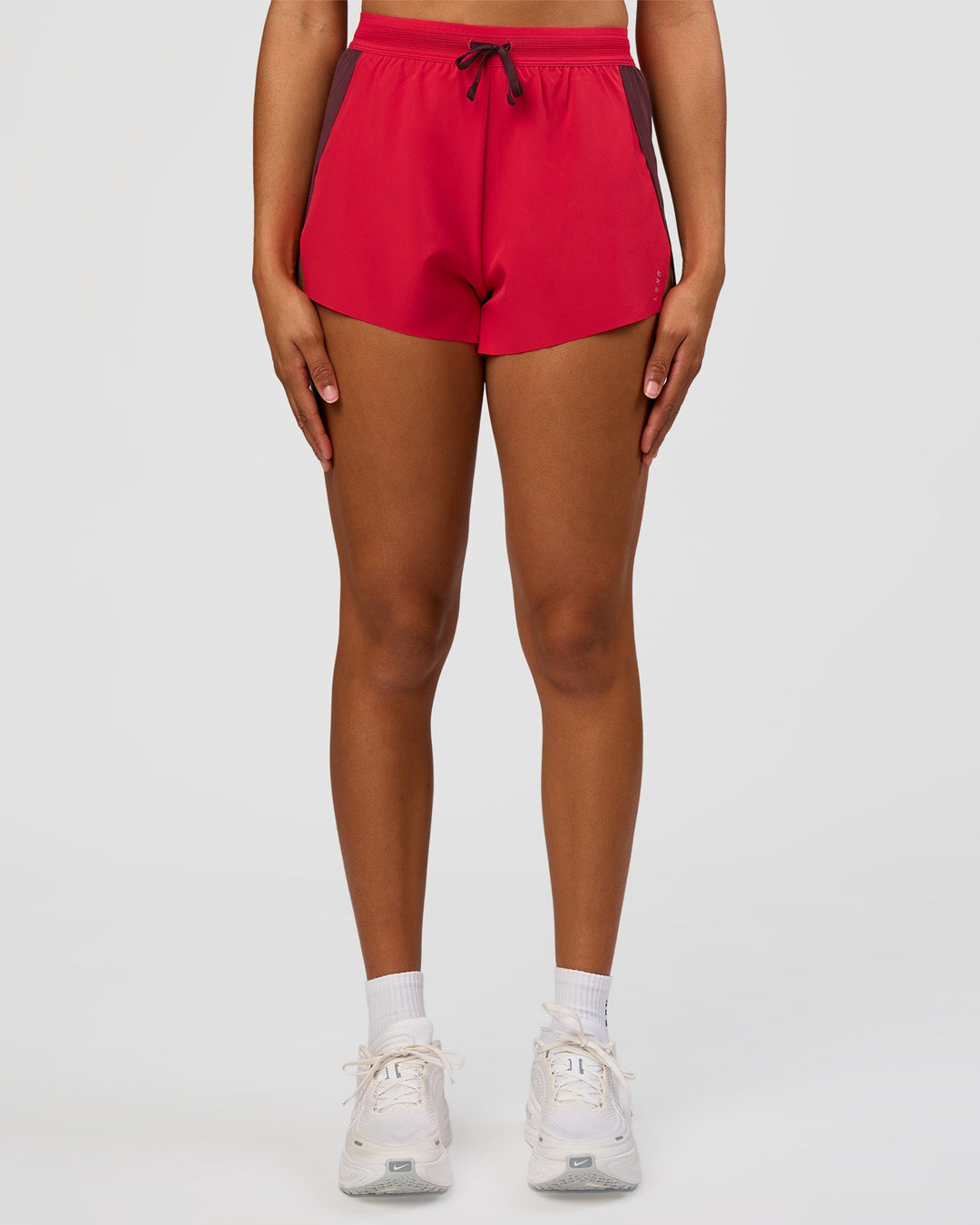 Woman wearing Accelerate 3" High-Rise Running Short - Cherry Lacquer-Scarlet | Model:Rosie | Size:S | - view 4