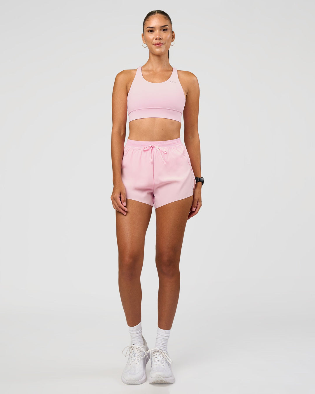 Woman wearing Accelerate 3" High-Rise Running Short - Marshmallow | Model:Rhiley | Size:S