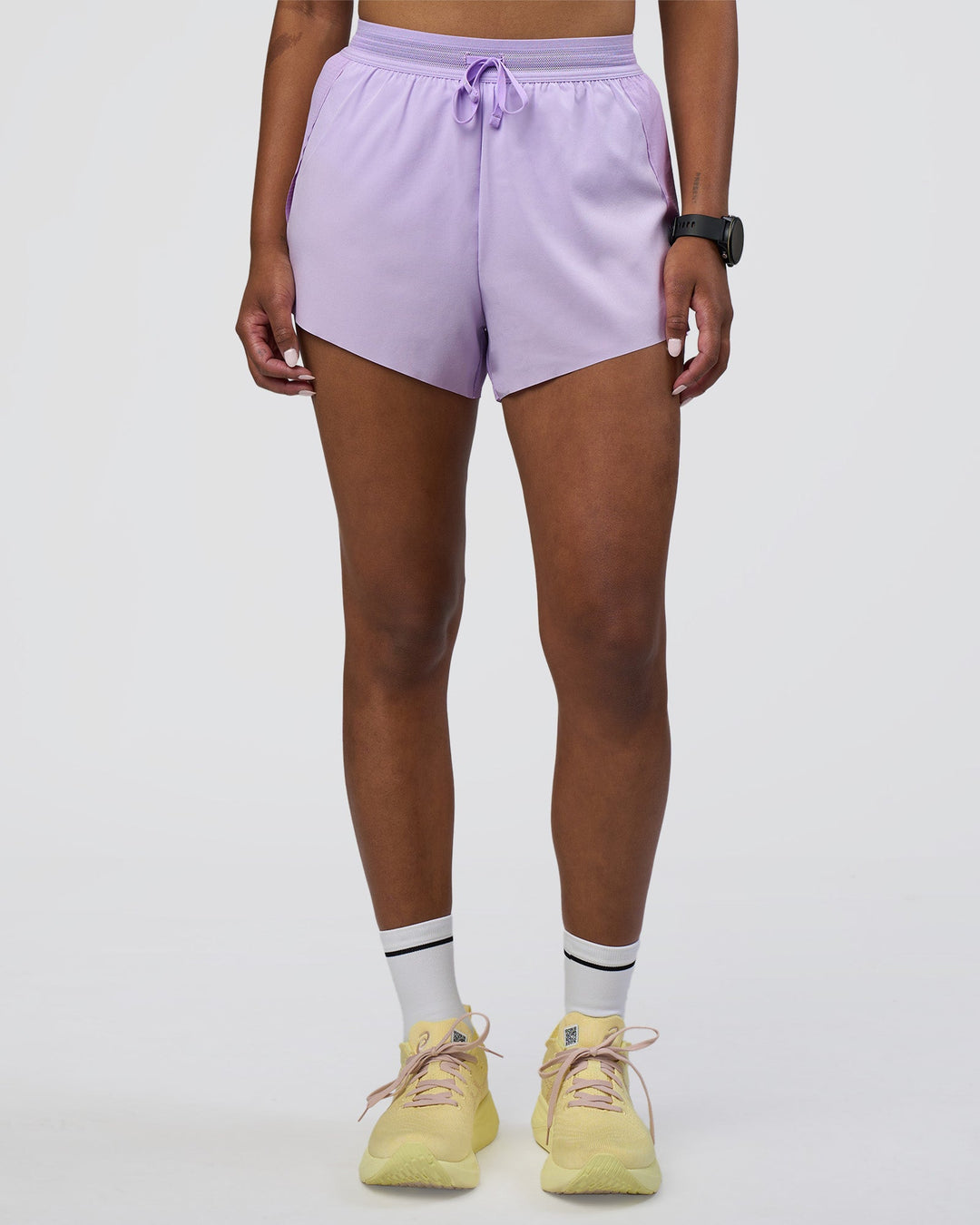 Woman wearing Accelerate 3&quot; High-Rise Running Short - Pale Lilac | Model:Rica | Size:S