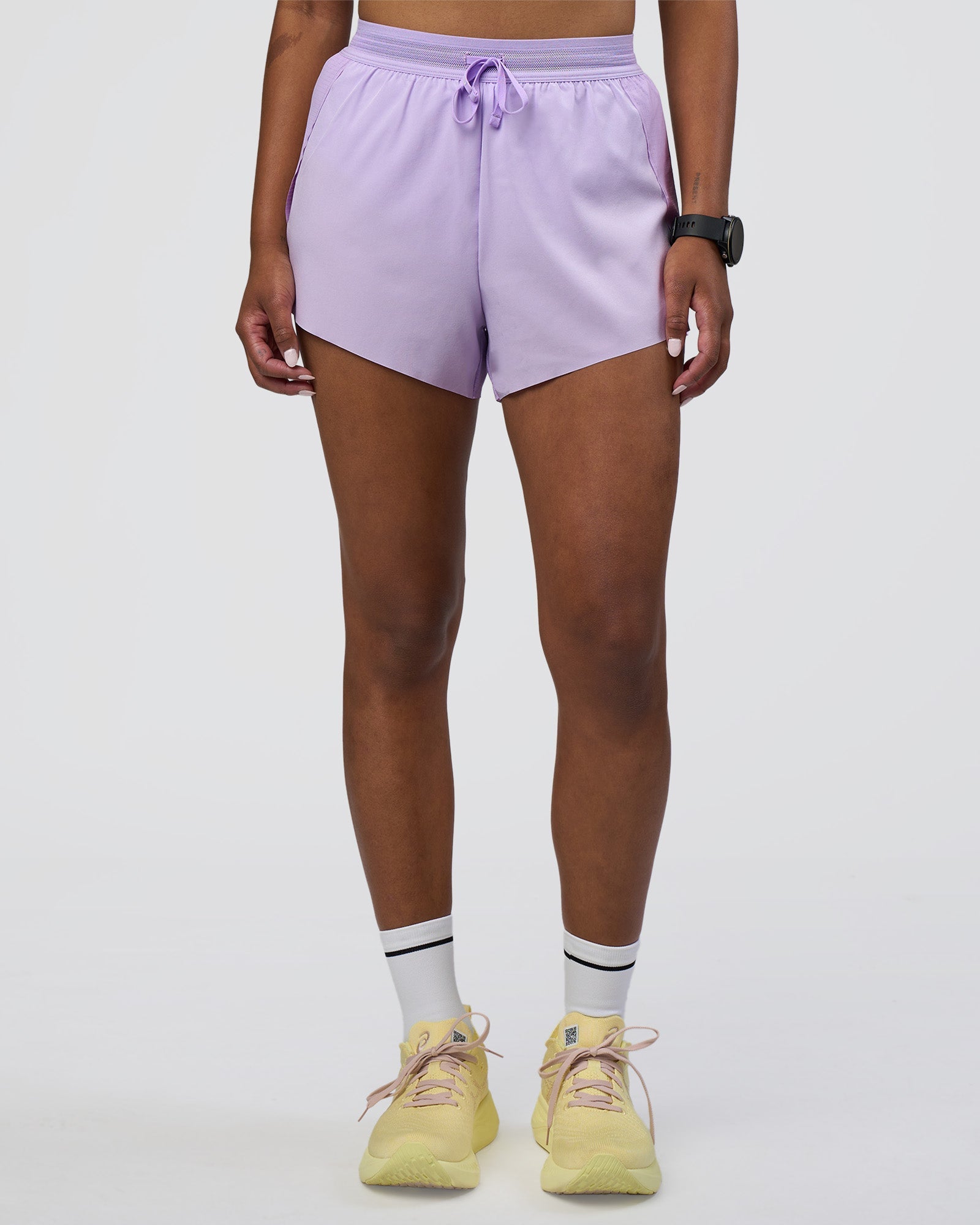 Woman wearing Accelerate 3" High-Rise Running Short - Pale Lilac | Model:Rica | Size:S