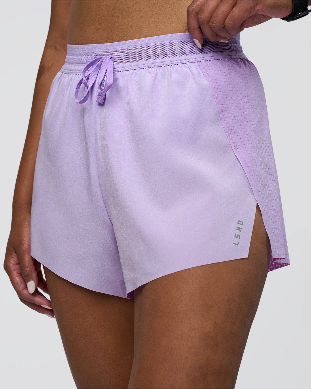Woman wearing Accelerate 3&quot; High-Rise Running Short - Pale Lilac | Model:Rica | Size:S