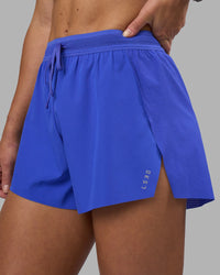Woman wearing Accelerate 3" High-Rise Running Short - Power Cobalt | Set:true | Angle:closeup | Model:Hannah | Size:S