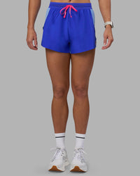 Woman wearing Accelerate 3" High-Rise Running Short - Power Cobalt-Open Air | Model:Hannah | Size:S