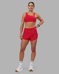 Woman wearing Accelerate 3" High-Rise Running Short - Scarlet | Model:Keisha | Size:S