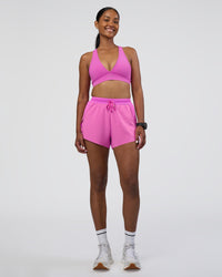 Woman wearing Accelerate 3" High-Rise Running Short - Ultra Fuchsia | Model:Rica | Size:S