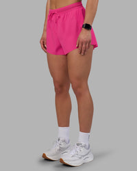 Woman wearing Accelerate 3" High-Rise Running Short - Ultra Pink | Model:Keisha | Size:S