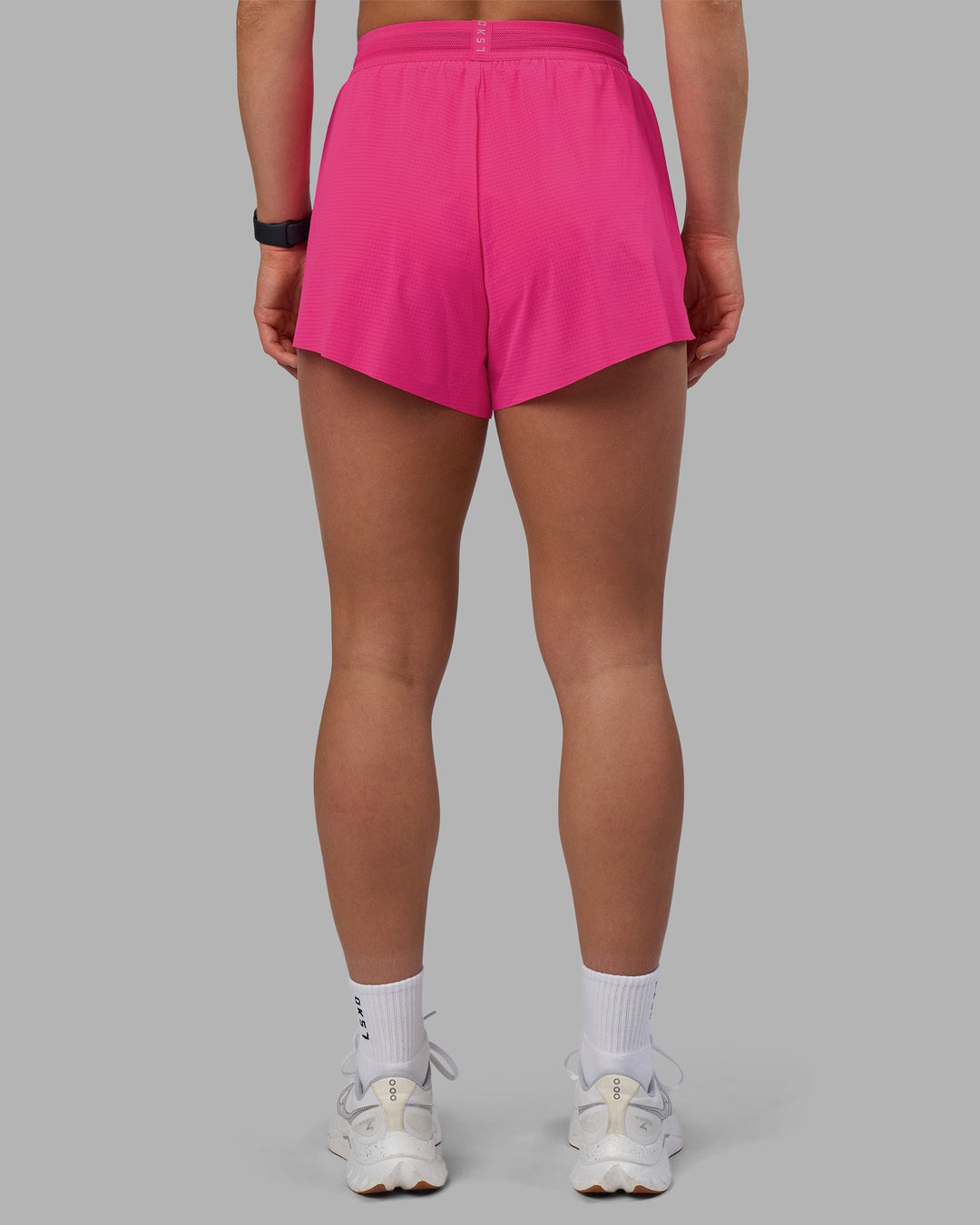 Woman wearing Accelerate 3&quot; High-Rise Running Short - Ultra Pink | Model:Keisha | Size:S