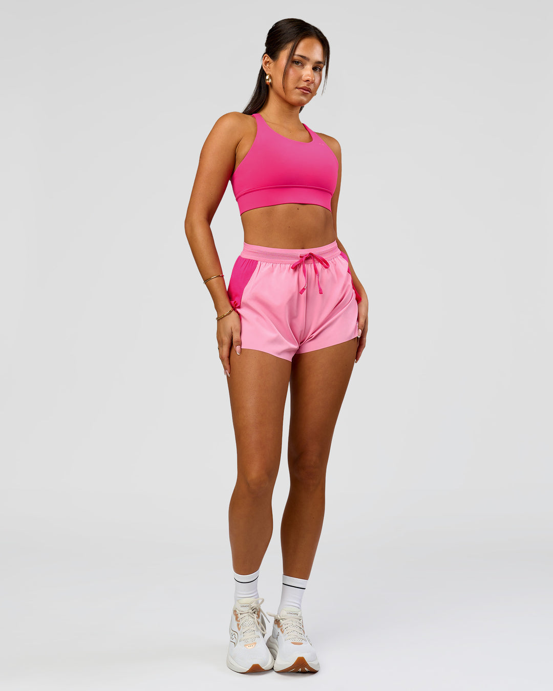 Woman wearing Accelerate 3" High-Rise Running Short - Ultra Pink-Candy Pink | Model:Bianca | Size:S