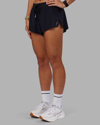 Woman wearing Accelerate 3" Running Short - Black | Set:true | Angle:side | Model:Vanessa | Size:S