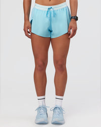 Woman wearing Accelerate 3" Mid-Rise Running Short - Baltic Sea-Off White | Set:true | Angle:front | Model:Keisha | Size:S | Thumbnail Index: 4