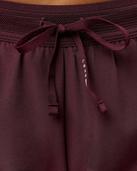 Woman wearing Accelerate 3" Mid-Rise Running Short - Cherry Lacquer-| Model:Bianca| Size:S |