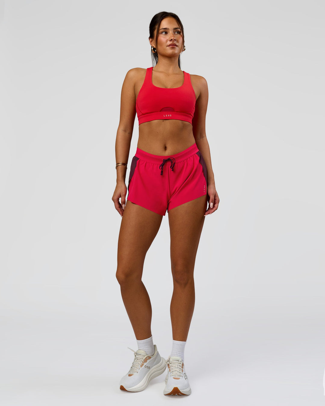 Woman wearing Accelerate 3" Mid-Rise Running Short - Cherry Lacquer-Scarlet | Model:Bianca | Size:S | - view 5