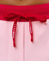 Woman wearing Accelerate 3" Mid-Rise Running Short - Scarlet-Marshmallow | Model:Amity | Size:S