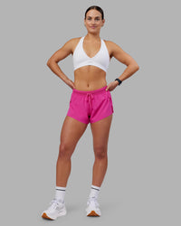Woman wearing Accelerate 3" Running Short - Ultra Pink | Model:Keisha | Size:S