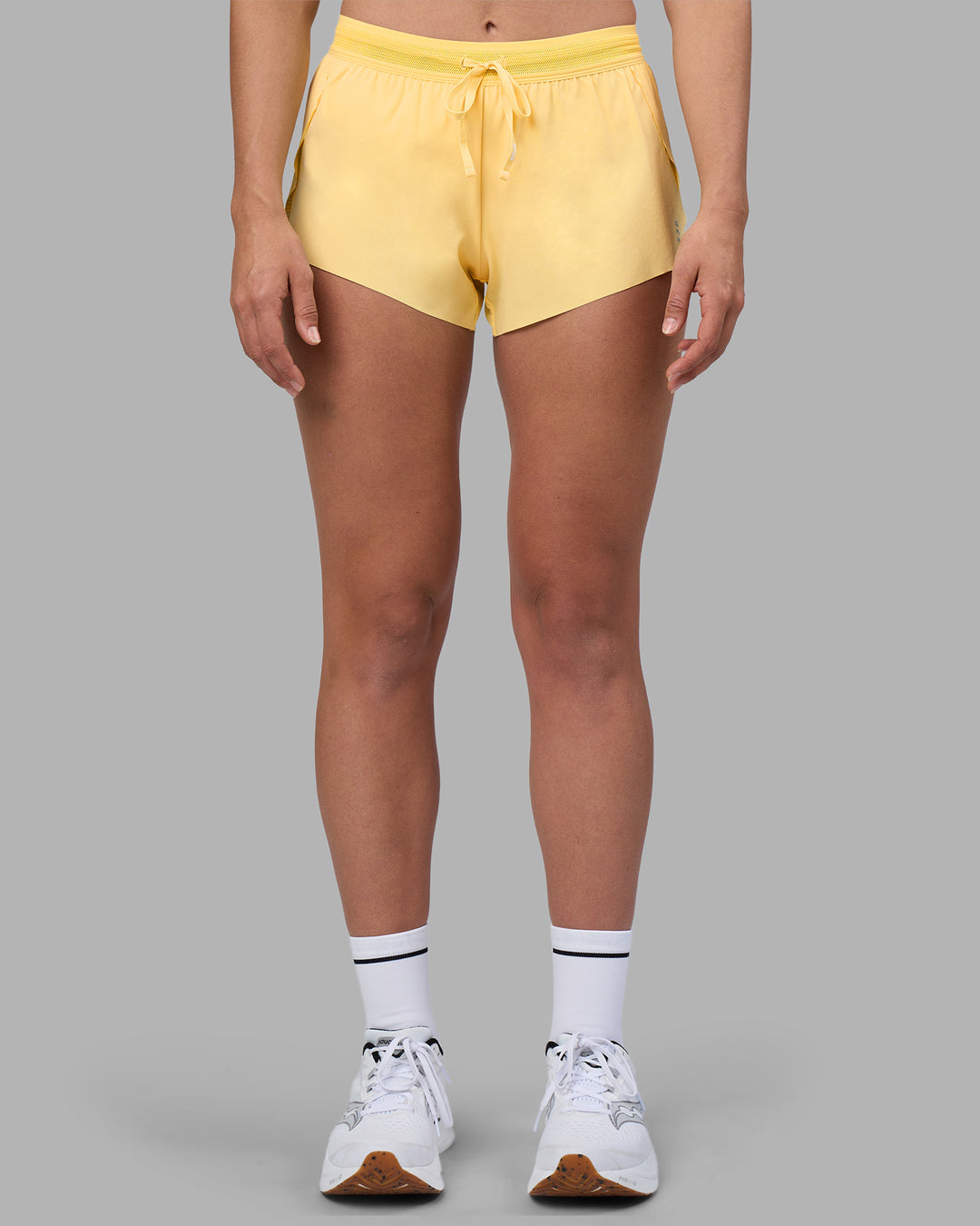 Woman wearing Accelerate 3&quot; Running Short - Lemon | Model:Sophie | Size:S