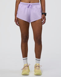Woman wearing Accelerate 3" Running Short - Pale Lilac | Set:true | Angle:front | Model:Rica | Size:S
