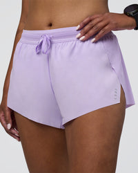 Woman wearing Accelerate 3" Running Short - Pale Lilac | Set:true | Angle:closeup | Model:Rica | Size:S
