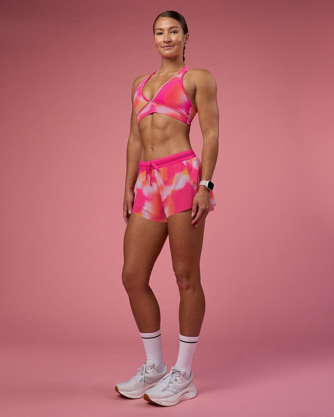 Woman wearing Accelerate 3&quot; Running Short - Pink Glow Print | Model:Hannah | Size:S