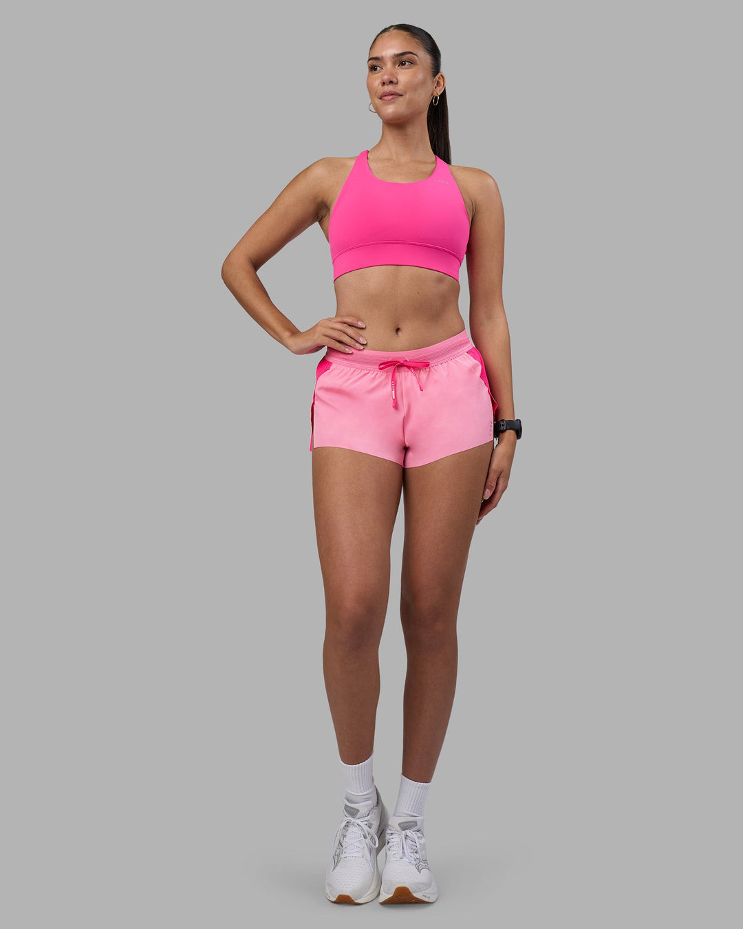 Woman wearing Accelerate 3&quot; Running Short - Ultra Pink-Candy Pink | Model:Rhiley | Size:S