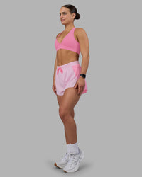 Woman wearing Accelerate 3" High-Rise Running Short - Candy Pink-Marshmallow | Model:Keisha | Size:S
