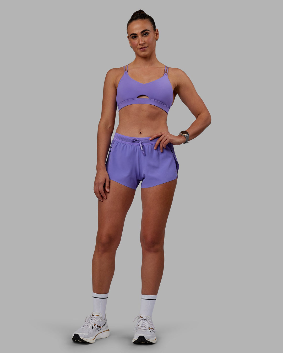 Woman wearing Accelerate Run Shorts - Dahlia Purple