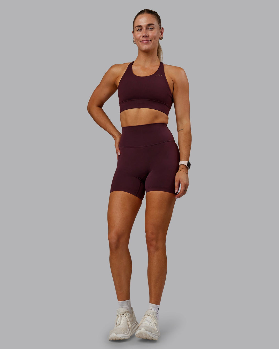 Woman wearing Accelerate Sports Bra - Cherry Lacquer | Model:Hannah | Size:S