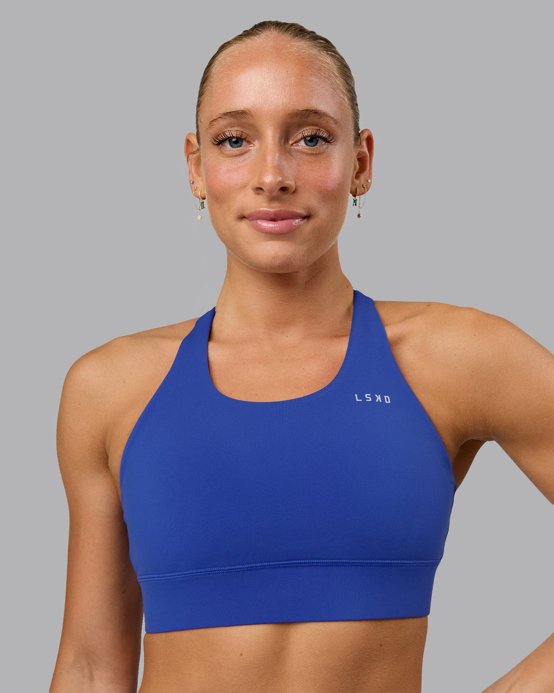 Woman wearing Accelerate Sports Bra in Power Cobalt | Size:S