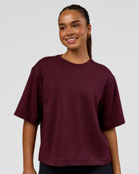 Woman wearing AfterDark ZeroCrease Cropped Tee - Cherry Lacquer | Model:Sophia | Size:S