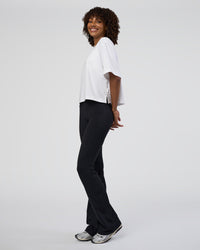 Woman wearing AfterDark ZeroCrease Cropped Tee - White | Model:Tomi | Size:S