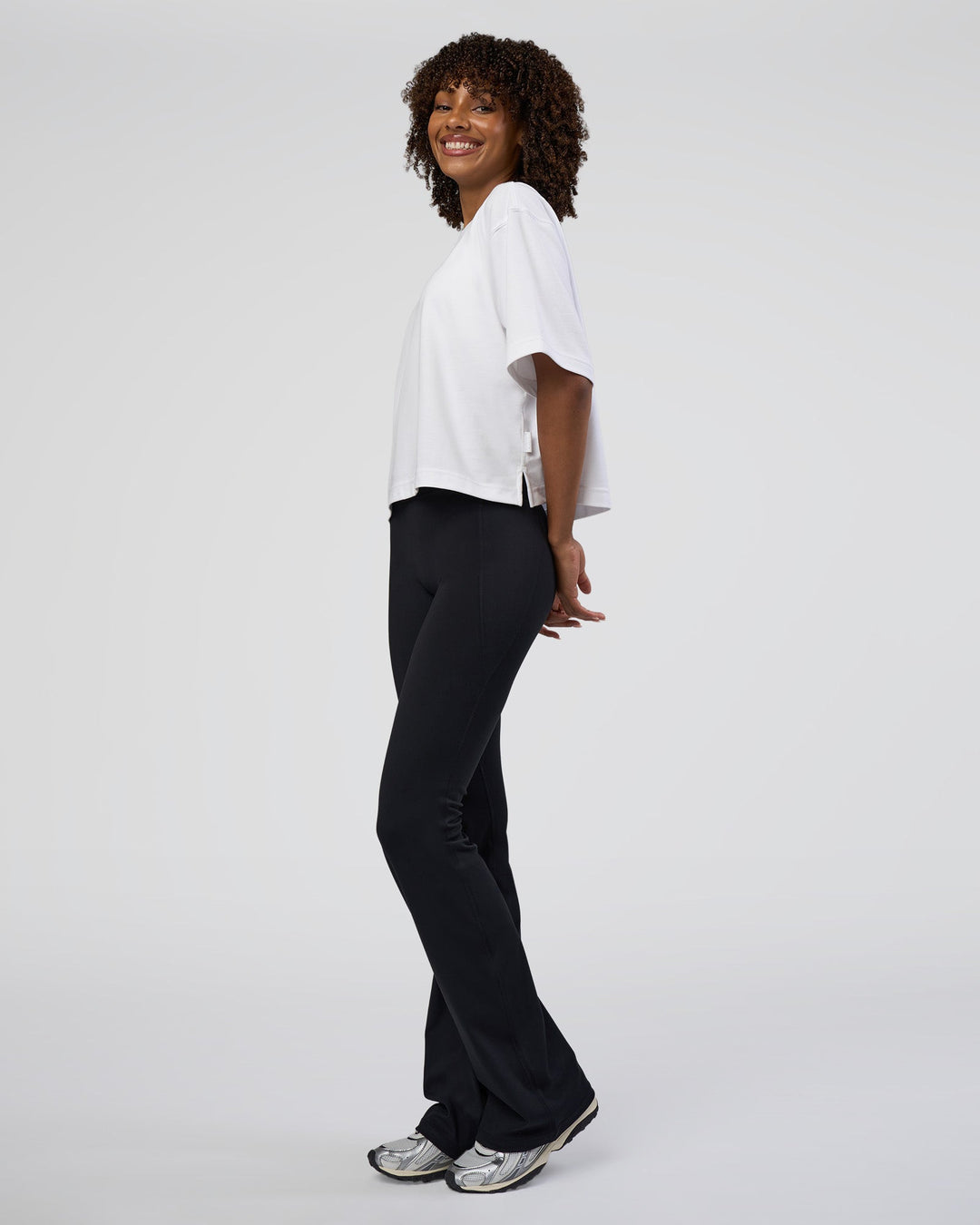 Woman wearing AfterDark ZeroCrease Cropped Tee - White | Model:Tomi | Size:S - view 4