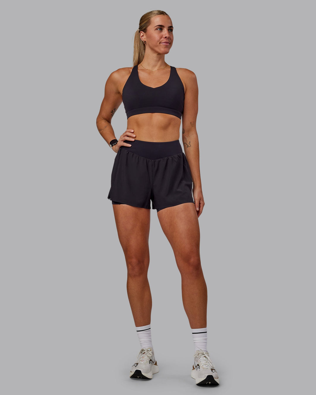 Woman wearing Agility 3&quot; Lined Run Shorts - Black