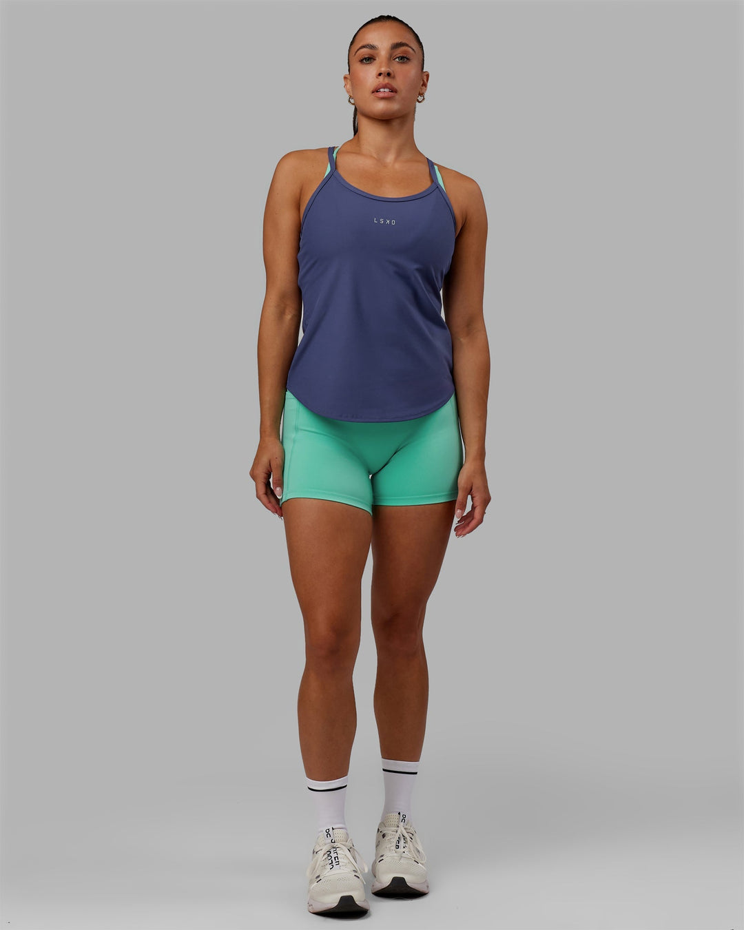 Woman wearing Agility Active Tank - Future Dusk