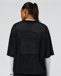 Woman wearing AirCore Jersey - Black-Black | Model:Rosie | Size:S