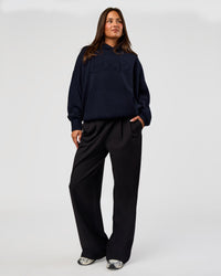 Woman wearing All Day Active Knitted Hoodie - Future Navy | Model:Bianca | Size:S