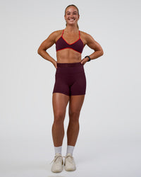 Woman wearing Ambience Sports Bra - Cherry Lacquer-Flame | Model:Sav | Size:S | Thumbnail Index: 4