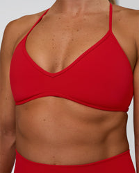 Woman wearing Ambience Sports Bra - Flame | Model:Sav | Size:S