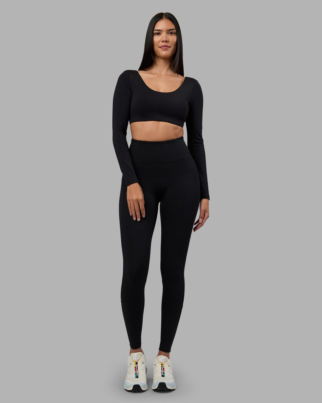 Woman wearing Aria Long Sleeve Sports Bra - Black | Model:Rhiley | Size:S